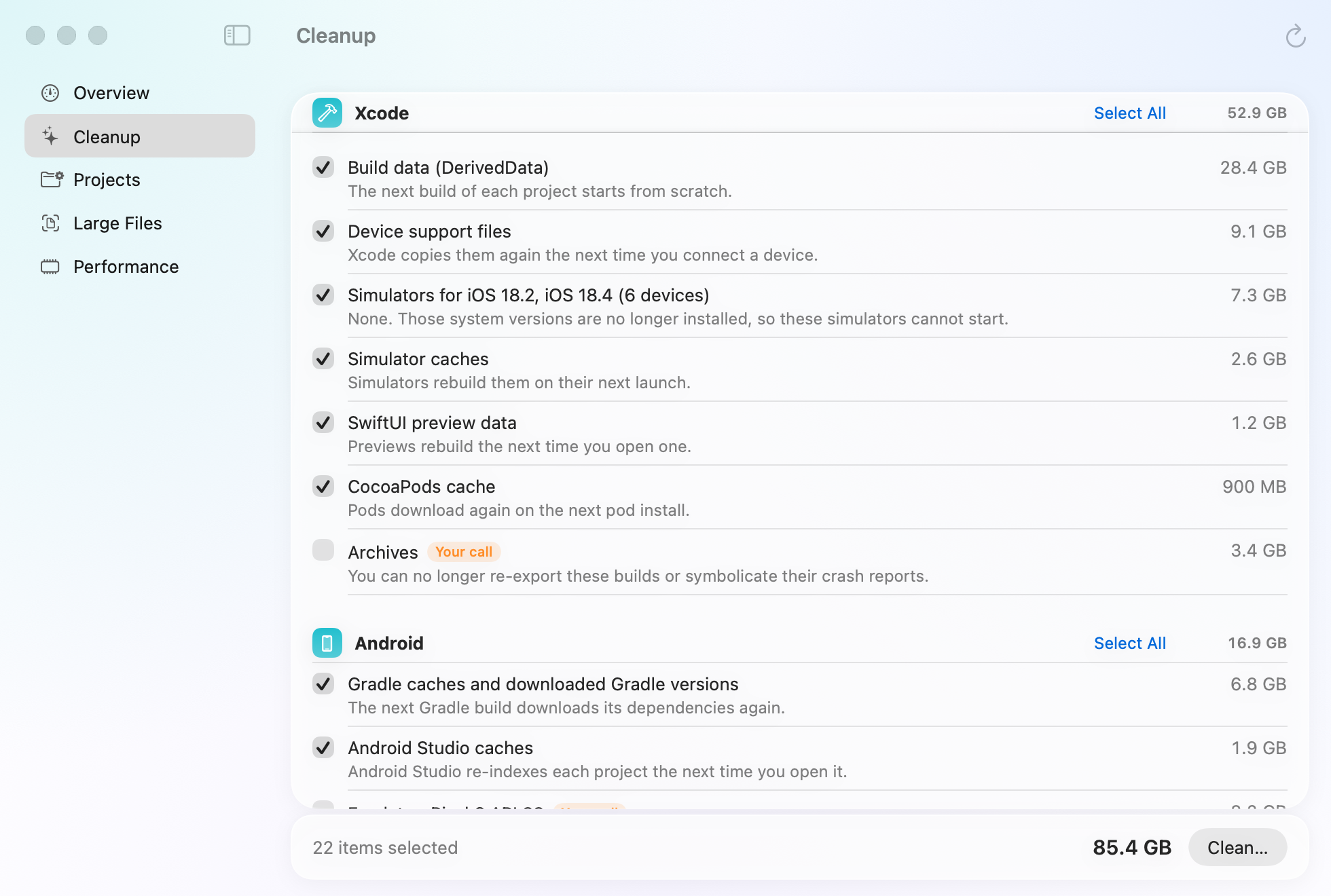 Mopup's Cleanup section: Xcode build data, device support files, old simulators and Android caches, each with its size and what removing it means. Archives and an old emulator are marked Your call.
