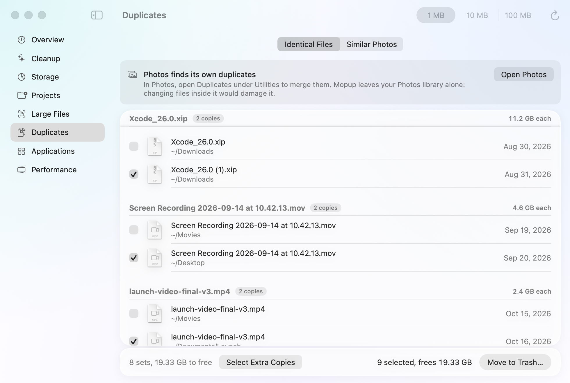 Mopup's Identical Files on a demo Mac: an Xcode download saved twice, a screen recording in Movies and on the Desktop, and a video in two folders, 19.33 GB in extra copies.